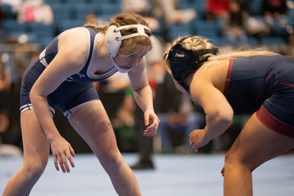 Washburn Rural's Addi Broxterman faces off against Topeka-Seaman's Madison Murray during 6-5A girls state wrestling.