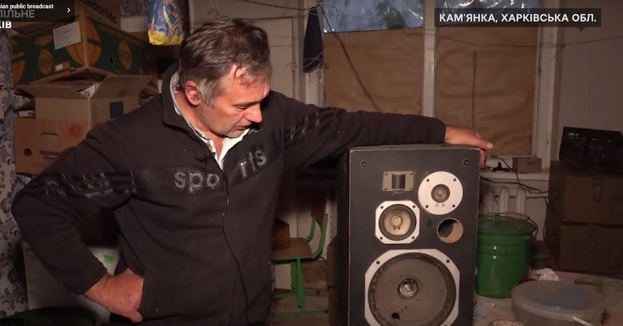 A still from a Suspilne broadcast on November 5, 2023, showing Vasyl Solianyk standing next to a speaker after his home was occupied by Russians.