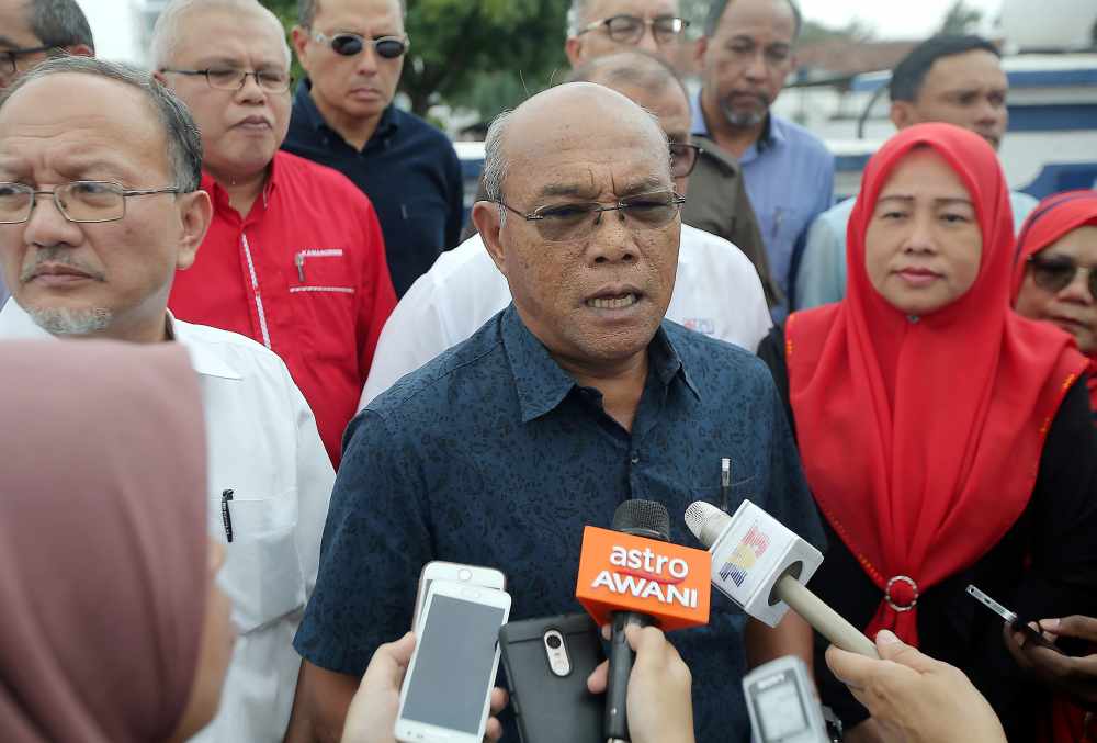 Former Perak Umno secretary Datuk Khusairi Abdul Talib and Perak Umno leaders lodge a police report at the Sungai Senam Police Station in Ipoh October 15, 2019. ― Picture by Farhan Najib