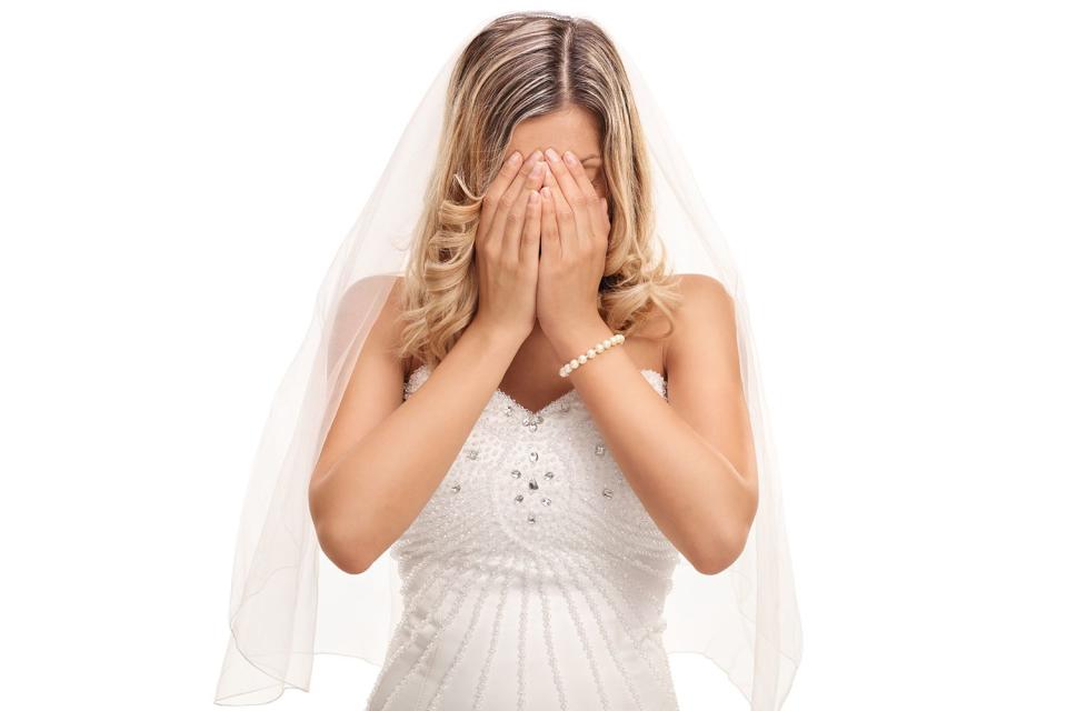 <p>Ljupco/Getty</p> Stock image of crying bride