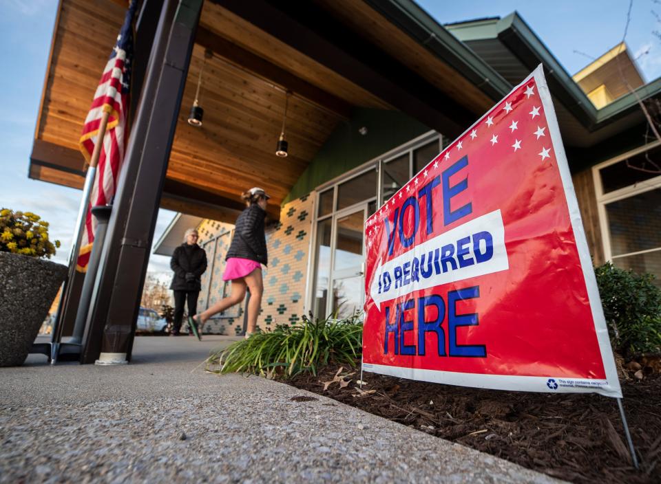 A woman arrives to vote at the St. Matthews Community Center on Election Day. Nov. 8, 2022