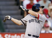 FILE PHOTO: Boston Red Sox's Brock Holt hits a sacrifice fly to score Daniel Nava against the Los Angeles Angels during the second inning of their MLB American League baseball game in Anaheim, California July 6, 2013. REUTERS/Danny Moloshok