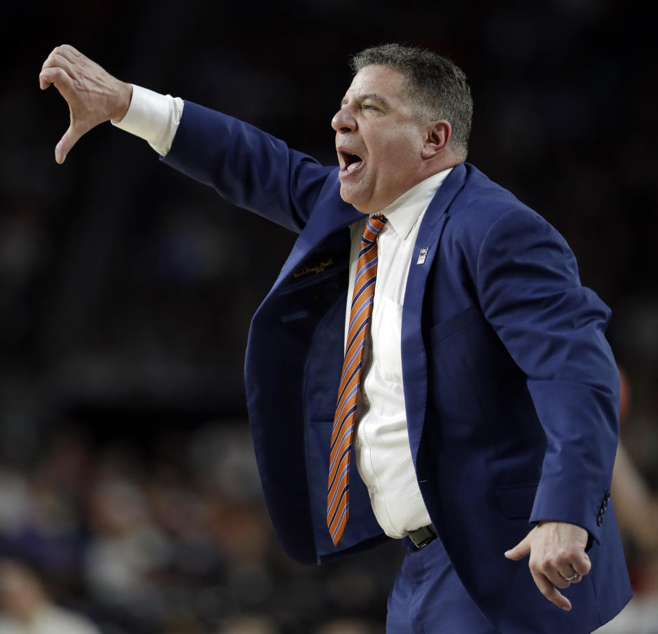 Auburn head coach Bruce Pearl directs his team during the second half in the semifinals of the Final Four NCAA college basketball tournament against Virginia, Saturday, April 6, 2019, in Minneapolis. (AP Photo/Jeff Roberson)