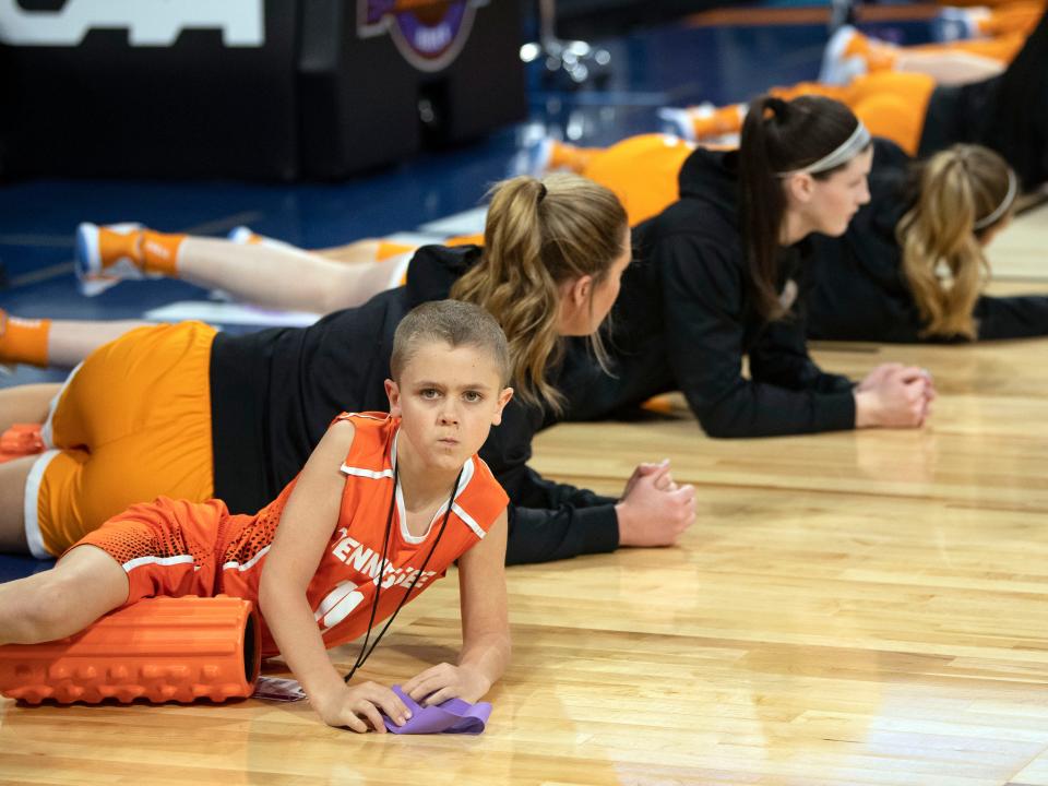 Jackson Harper, son of Kellie and Jon Harper, warms up with the Lady Vols basketball team before the start of the NCAA tournament Sweet 16 game against Louisville on Saturday, March 26, 2022. in Wichita, KS.