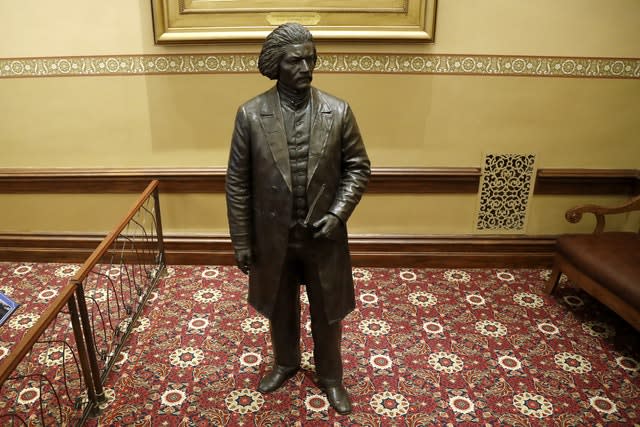 A bronze statue of abolitionist Frederick Douglass at the Maryland State House