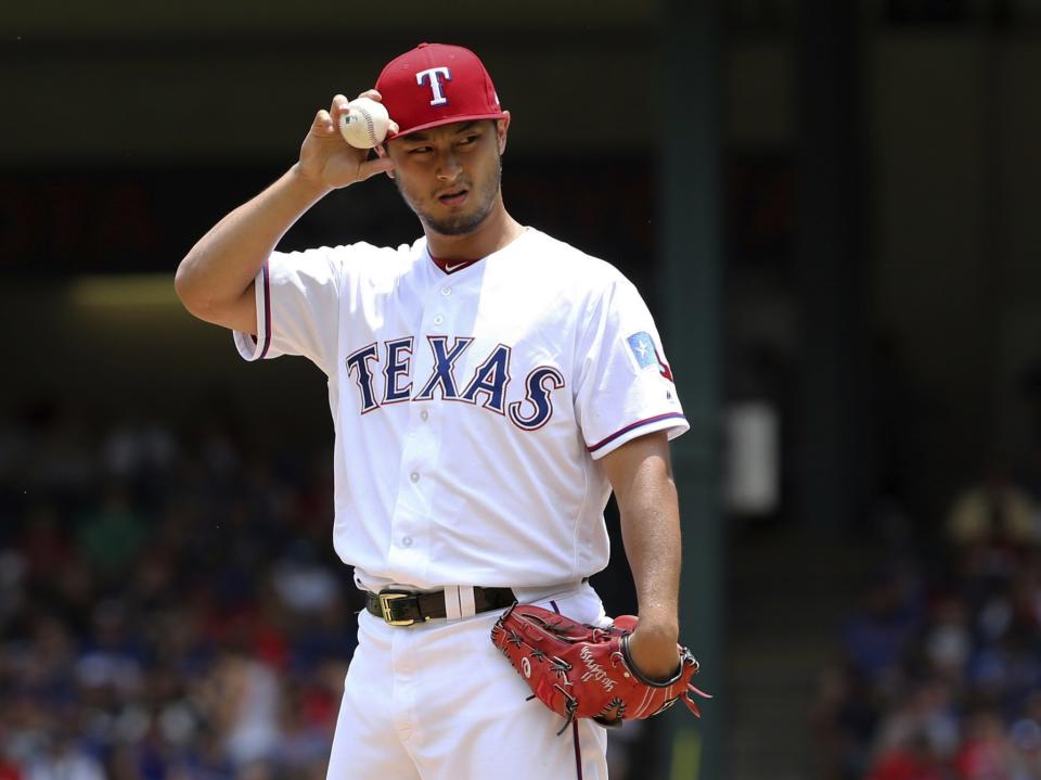 Yu Darvish received one final salute from the Texas Rangers. (AP)