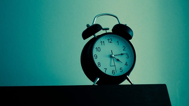 Alarm clock sitting on a desk