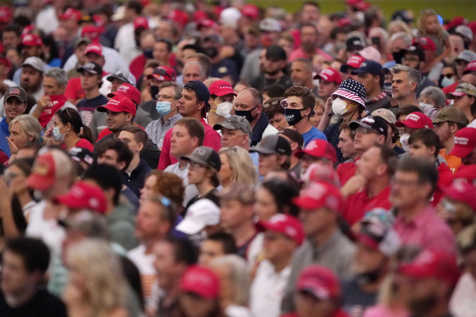 Supporters listens as President Donald Trump speaks at a campaign rally Tuesday, Sept. 8, 2020, in Winston-Salem, N.C. (AP Photo/Chris Carlson)