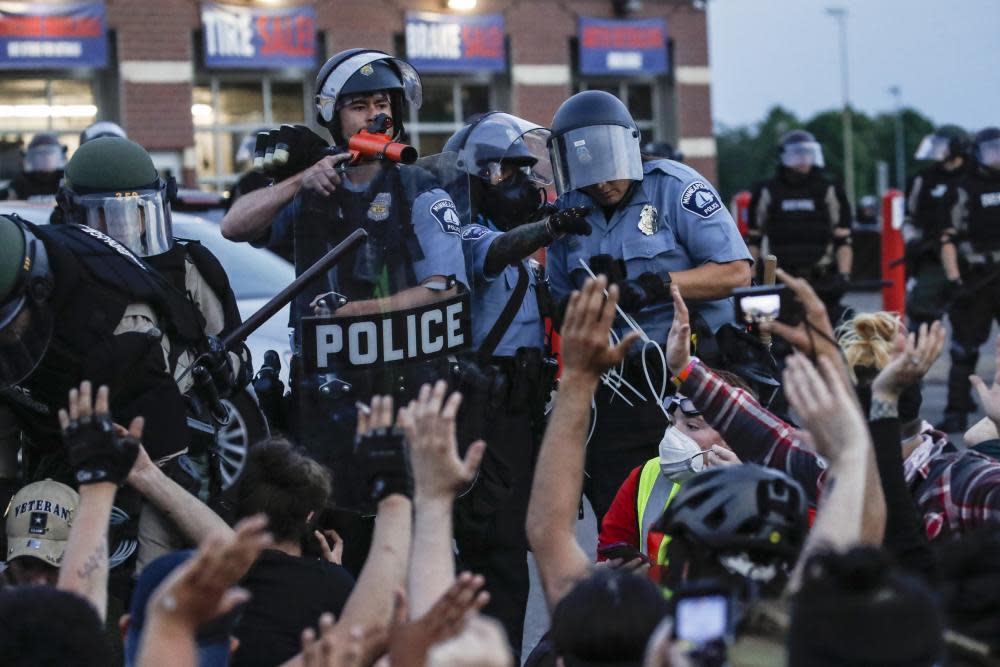 <span>Photograph: John Minchillo/AP</span>