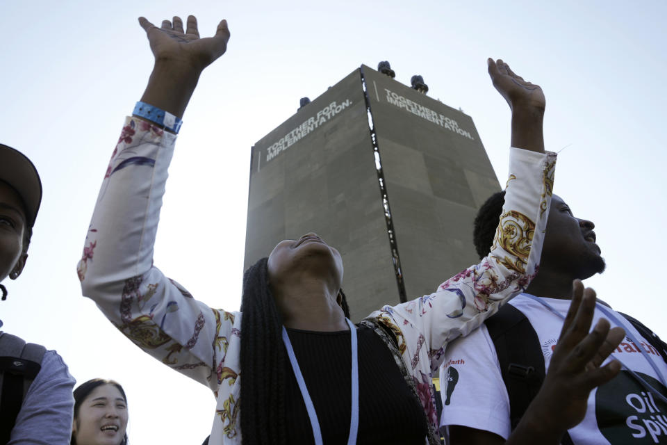 Demonstrators attend a protest against pipelines in East Africa at the COP27 U.N. Climate Summit, Friday, Nov. 11, 2022, in Sharm el-Sheikh, Egypt. (AP Photo/Nariman El-Mofty)