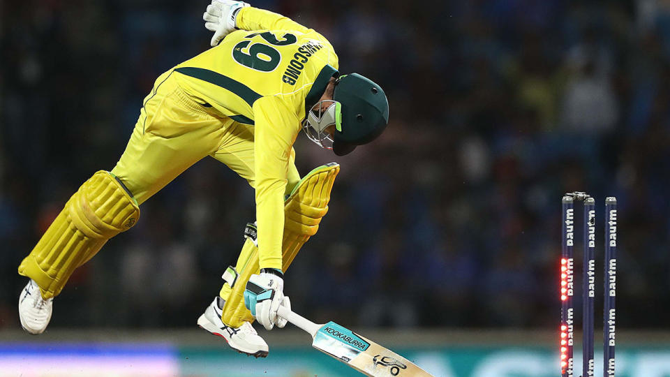 Peter Handscomb is run out by Ravindra Jadeja. (Photo by Robert Cianflone/Getty Images)