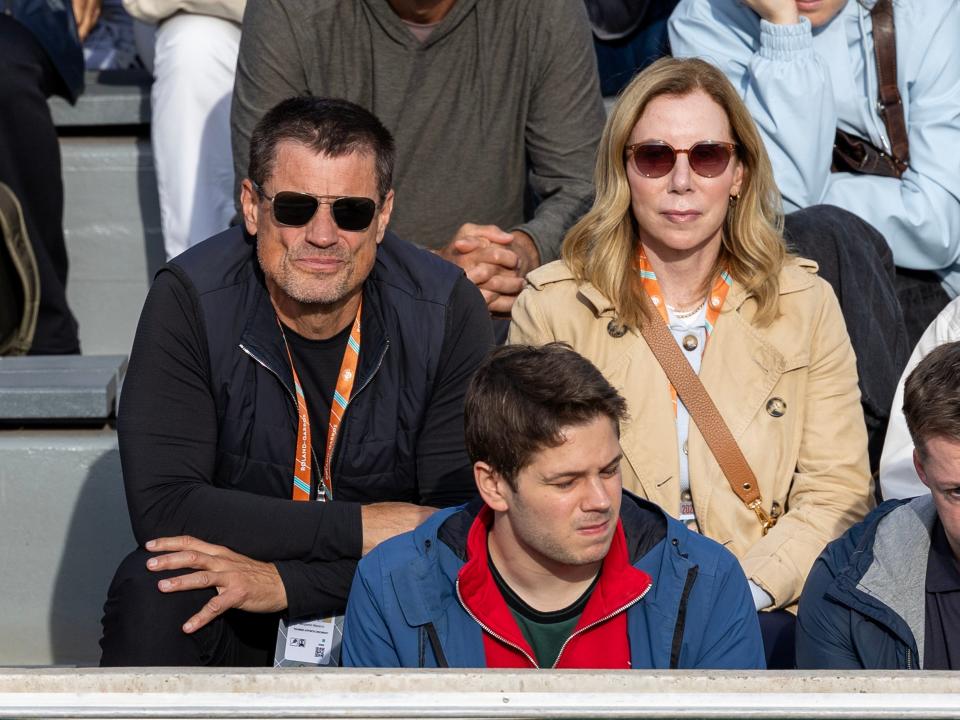 Ben Navarro and Kelly Navarro watch their daughter, Emma Navarro, during the first round of the 2024 French Open.