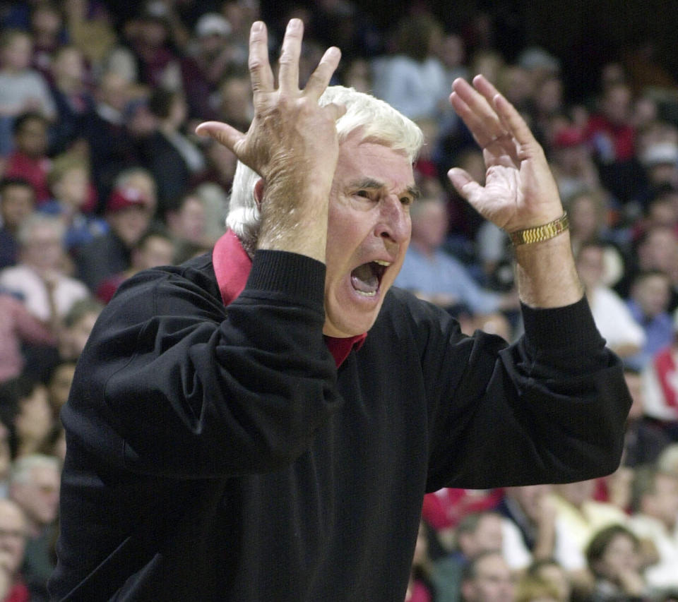 FILE - Texas Tech coach Bob Knight yells from the sidelines in the first half of a college basketball game against Houston, Dec. 14, 2001 in Houston. Bob Knight, the brilliant and combustible coach who won three NCAA titles at Indiana and for years was the scowling face of college basketball has died. He was 83. Knight's family made the announcement on social media Wednesday evening, Nov. 1, 2023. (AP Photo/Pat Sullivan, File)