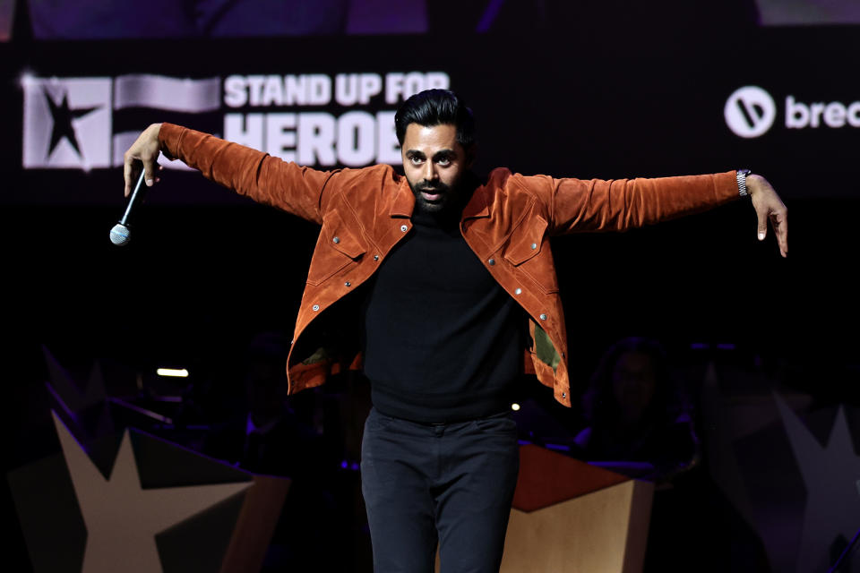 NEW YORK, NEW YORK - NOVEMBER 07: Hasan Minhaj performs during the 16th Annual Stand Up For Heroes Benefit presented by Bob Woodruff Foundation and NY Comedy Festival at David Geffen Hall on November 07, 2022 in New York City. (Photo by Jamie McCarthy/Getty Images for Bob Woodruff Foundation)