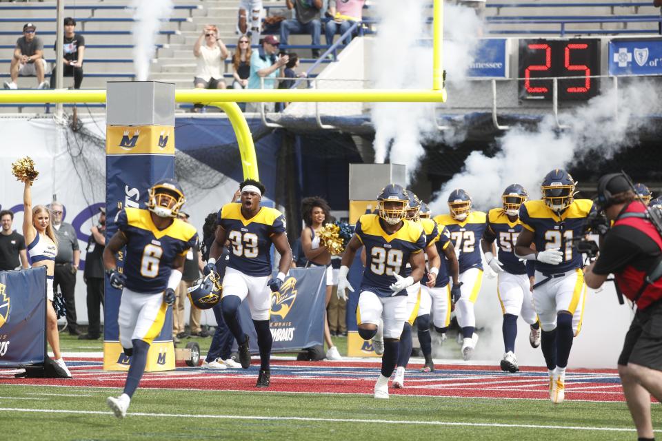 The Memphis Showboats run out of the tunnel at the beginning of the game against the Philadelphia Stars at the Simmons Liberty Bank Stadium in Memphis on April 15.