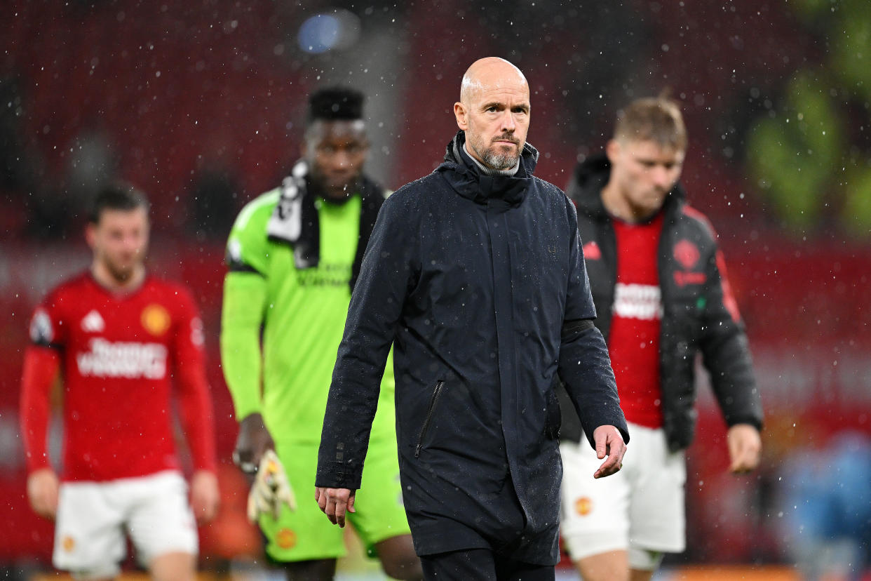 Manchester United manager Erik ten Hag looks dejected after losing to Manchester City in the English Premier League.