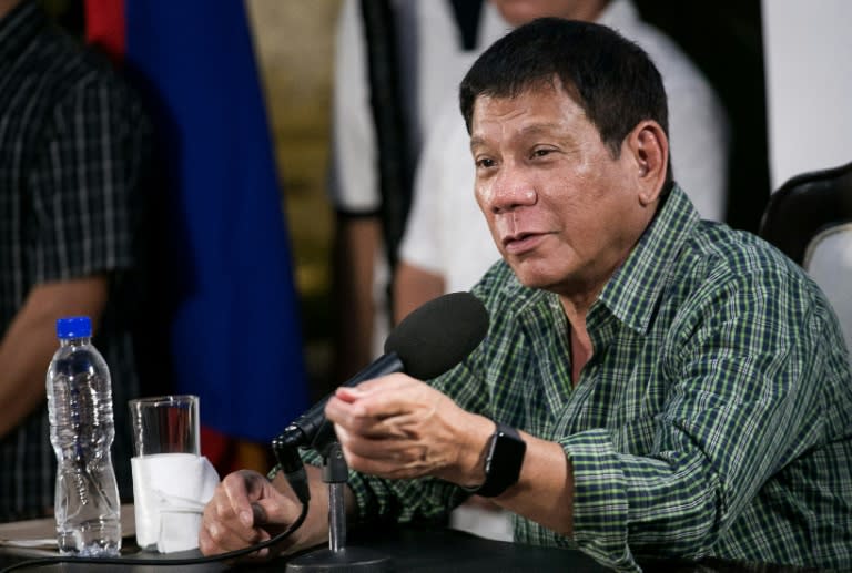 Then Philippines president-elect Rodrigo Duterte speaks during a press conference in Davao on May 31, 2016