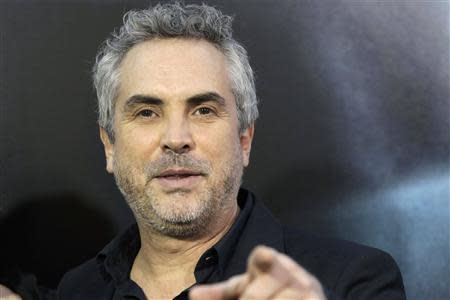 Producer Alfonso Cuaron arrives for the film premiere of "Gravity" in New York in this October 1, 2013 file photograph. REUTERS/Andrew Kelly/Files