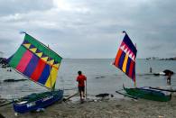 An iconic symbol of Zamboanga city is the vinta, a traditional boat with colorful sail originally constructed by the Bajau and Moros. You can now ride the vinta every Friday, Saturday and Sunday for a minimal fee. One of the highlights of Zamboanga La Hermosa Festival is the race of the colorful vintas known as Regatta de Zamboanga. (Photo by Gael Hilotin)