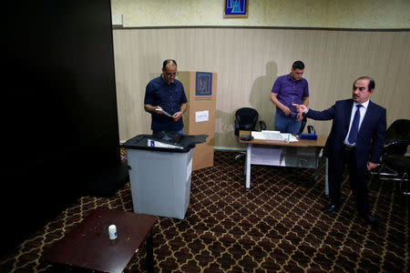 The head of Iraq's Independent Higher Election Commission Dr. Riyhad Al-Badran speaks during an interview with Reuters in Baghdad, Iraq April 21, 2018. REUTERS/Khalid al Mousily