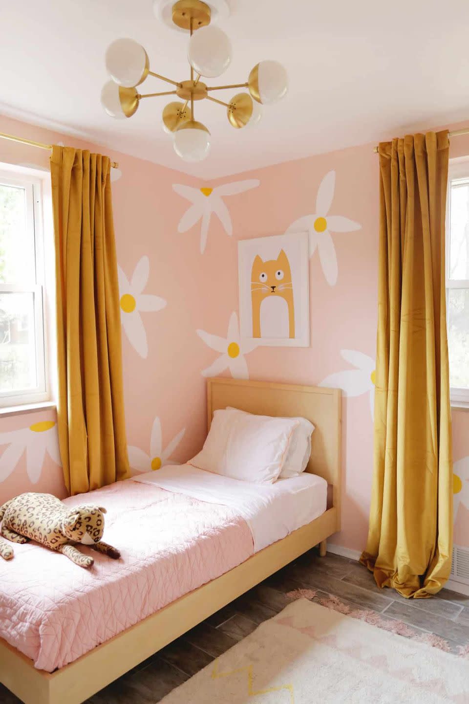 painted daisy walls in girls bedroom