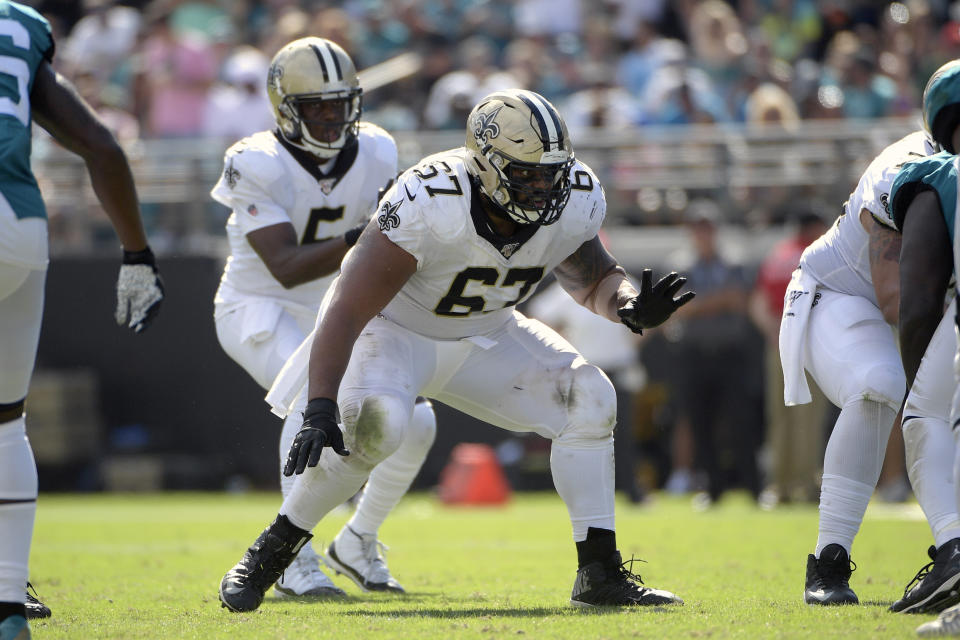 FILE - In this Oct. 13, 2019, file photo, New Orleans Saints offensive guard Larry Warford (67) sets up to block for quarterback Teddy Bridgewater (5) during the second half of an NFL football game against the Jacksonville Jaguars in Jacksonville, Fla. After being selected for the last three Pro Bowls, Warford was cut by New Orleans earlier this month. He immediately became the most enticing offensive lineman on the market, and will likely find a starting spot somewhere. (AP Photo/Phelan M. Ebenhack, File)