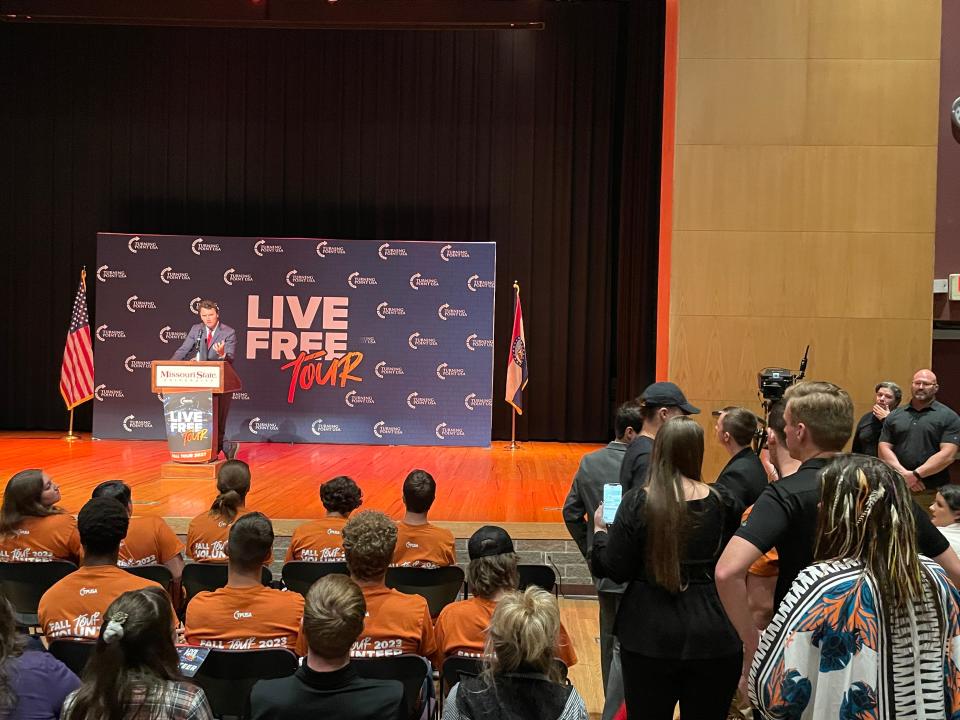 Charlie Kirk, founder of Turning Point USA, invites the audience to pose questions to him at the Plaster Student Union Theater on the Missouri State University campus in Springfield on October 19, 2023.