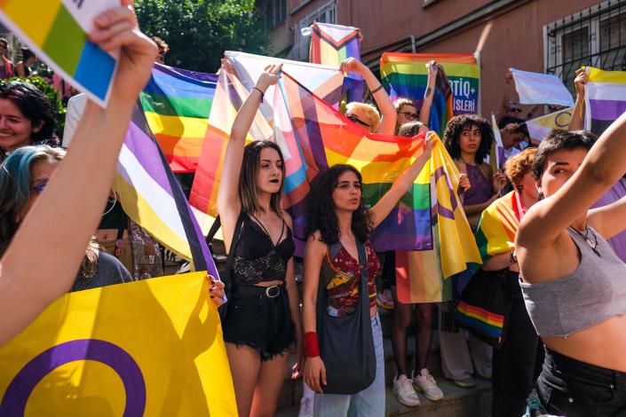 Participants shout slogans of LGBTQ community's march during the Gay Pride parade in Istanbul.