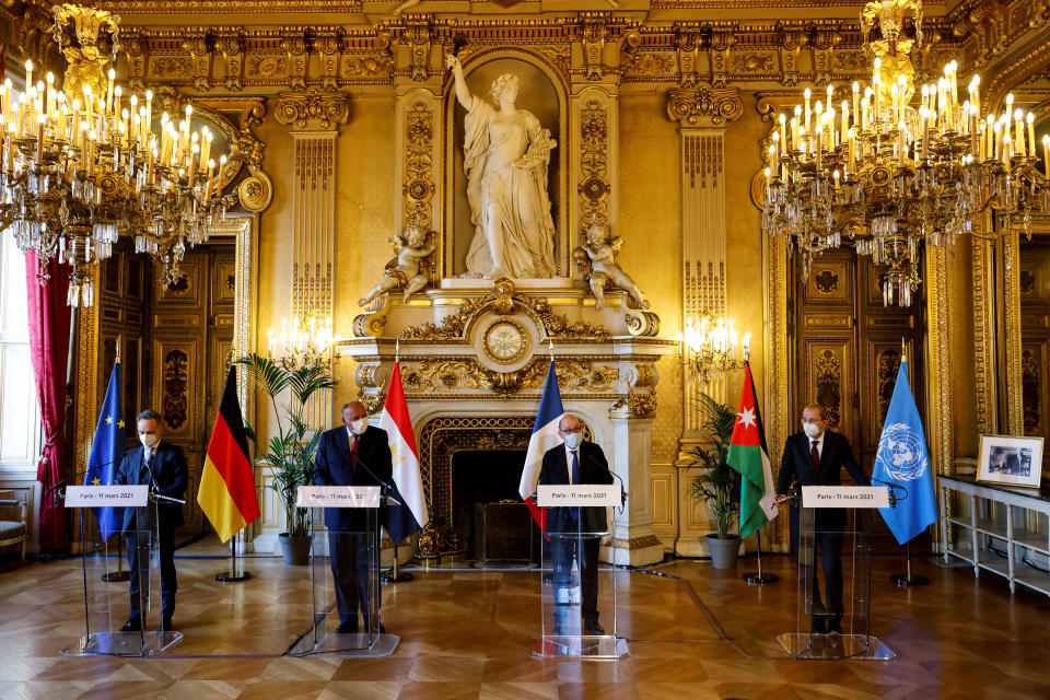 From left to right, German Foreign Minister Heiko Maas, Egyptian Foreign Minister Sameh Shoukry, French Foreign Affairs Minister Jean-Yves Le Drian and Jordanian Foreign Minister Ayman Safadi speak to the media during a press conference in Paris, Thursday, March 11, 2021. The new U.N. special coordinator for the Middle East peace process Tor Wennesland will meet Thursday in Paris with the foreign ministers of Egypt, Jordan, Germany and France to discuss possibilities for building confidence between Israel and the Palestinians. (Ludovic Marin/Pool Photo via AP)