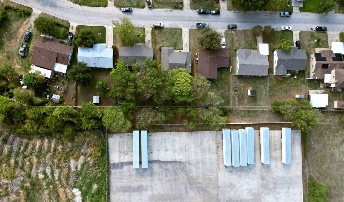 Parked semi-trailers sit adjacent to single-family homes in the Echo Heights neighborhood. Residents and community members recently formed Fort Worth Environmental Coalition of Communities to combat industrialization in the neighborhood.