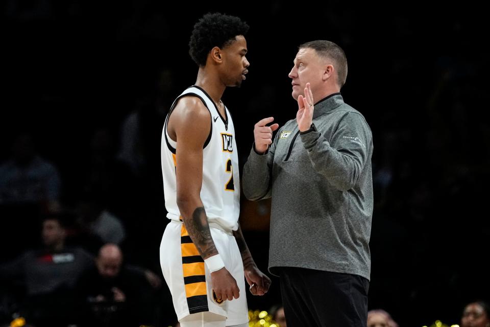 Virginia Commonwealth head coach Mike Rhoades, right, talks to Zeb Jackson (2) during the first half of an NCAA college basketball game against the Saint Louis in the semifinals of the Atlantic 10 Conference Tournament, Saturday, March 11, 2023, in New York. (AP Photo/Frank Franklin II)