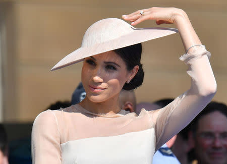 Meghan, Duchess of Sussex attends a garden party at Buckingham Palace, in London, Britain May 22, 2018. Dominic Lipinski/Pool via Reuters/File Photo