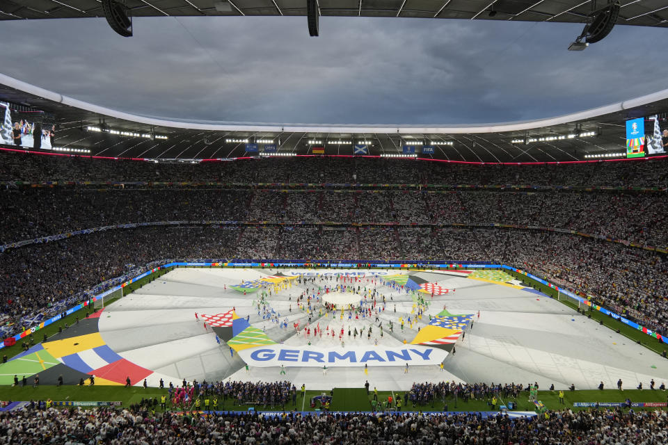 Dancers perform during the opening ceremony ahead of the Group A match between Germany and Scotland at the Euro 2024 soccer tournament in Munich, Germany, Friday, June 14, 2024. (AP Photo/Sergei Grits)