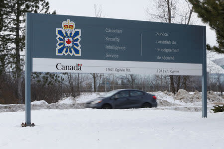 A vehicle passes a sign outside the Canadian Security Intelligence Service (CSIS) headquarters in Ottawa, Ontario, Canada January 17, 2017. REUTERS/Chris Wattie