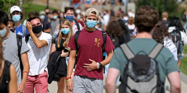 students wearing masks at Boston College campus