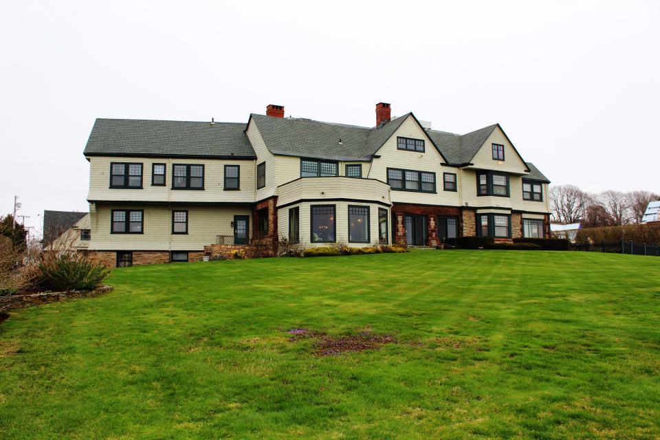 A view of Honeysuckle Lodge from the back. The house sits adjacent to the Cliff Walk.