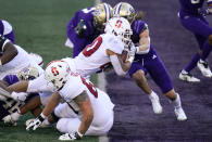 Stanford running back Austin Jones dives into the end zone on a touchdown run against Washington in the first half of an NCAA college football game Saturday, Dec. 5, 2020, in Seattle. (AP Photo/Elaine Thompson)