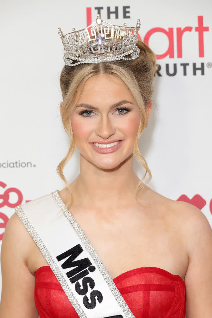 Miss America 2023 winner Mallory Miss America 2023 winner Mallory Miss America 2023 winner Mallory Hagan poses in a crown and sash on the red carpet at an event