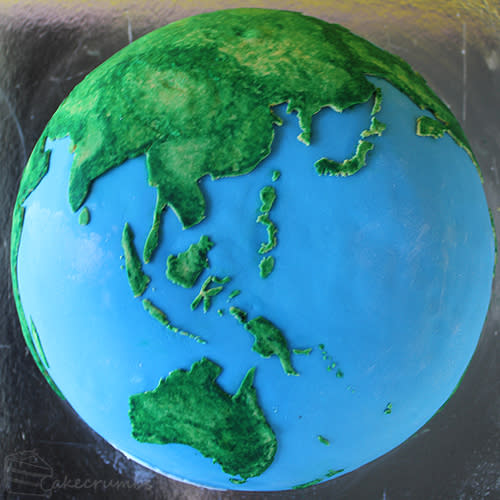 The continents and oceans of the cake are made out of fondant and edible paint. Image uploaded on Aug. 27, 2013.