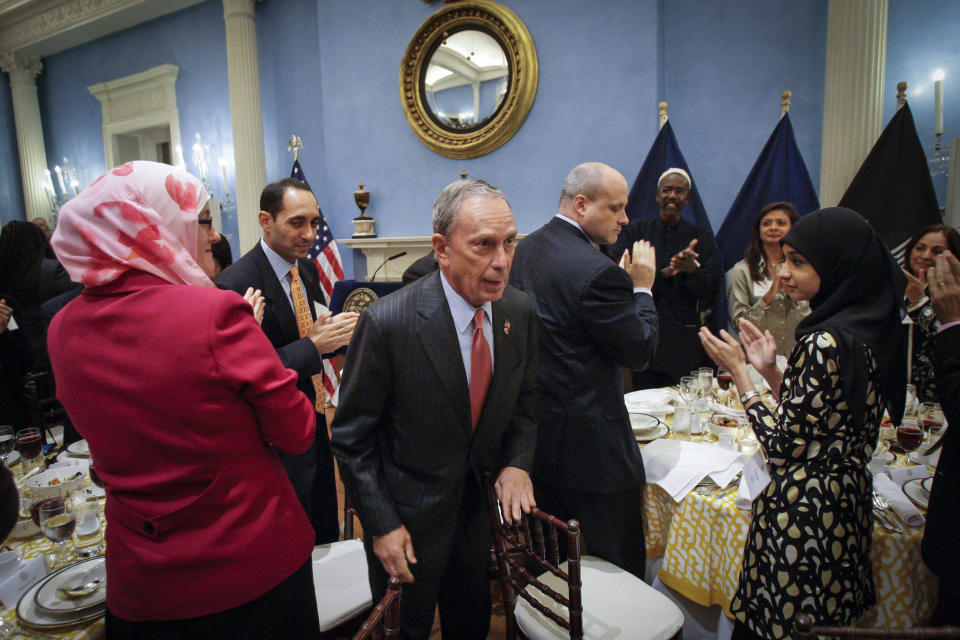 File-This photo from Tuesday Aug. 24, 2010, shows New York City Mayor Michael Bloomberg, returning to his seat after his remarks during a dinner in observance of Iftar at Gracie Mansion in New York. When a proposal to build a Muslim community center near ground zero generated a bitter debate over tolerance and the legacy of 9/11, Bloomberg said not allowing the mosque to be built two blocks from ground zero would be "compromising our commitment to fighting terror with freedom." (AP Photo/Frank Franklin II, Pool, File)