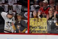 <p>A Pittsburgh Penguins fan holds a sign that reads, ‘Hey Crosby Please Take A Selfie With Me!’ prior to Game Four of the Eastern Conference Final against the Ottawa Senators during the 2017 NHL Stanley Cup Playoffs at Canadian Tire Centre on May 19, 2017 in Ottawa, Canada. (Photo by Jana Chytilova/Freestyle Photo/Getty Images) </p>