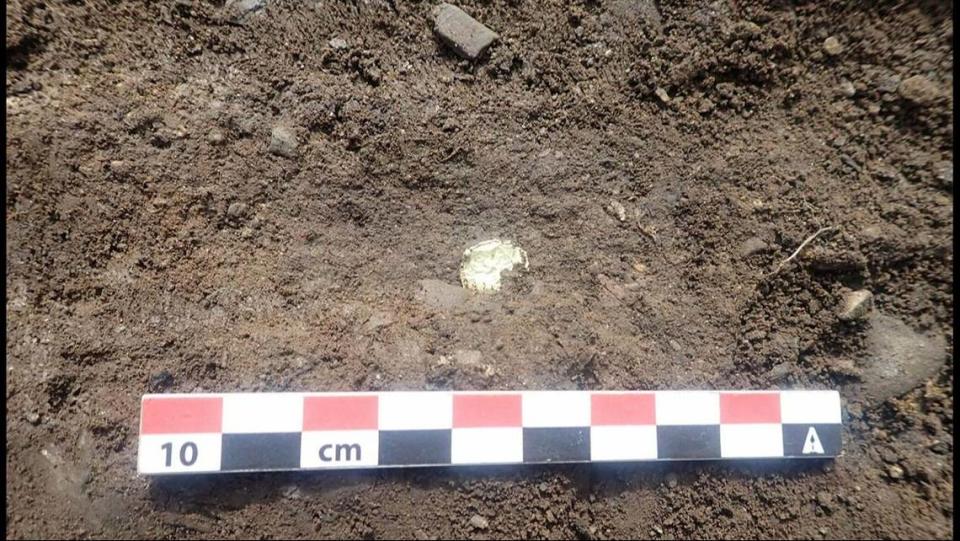 The gold pieces are thin as paper and about the size of a fingernail, archaeologists said.