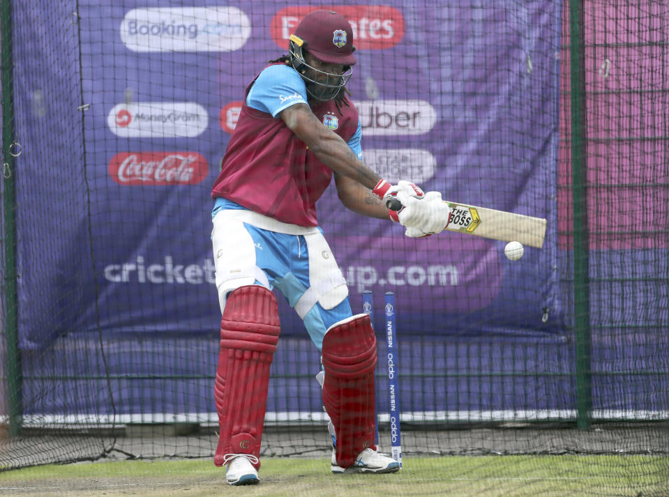 West Indies' Chris Gayle bats in the nets during a training session ahead of their Cricket World Cup match against India at Old Trafford in Manchester, England, Wednesday, June 26, 2019. (AP Photo/Aijaz Rahi)