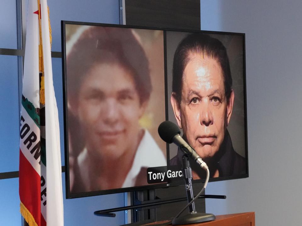 A screen showed photos of murder suspect Tony Garcia, now 68, of Oxnard, who was charged in a pair of 1981 cold-case murders on Thursday. Authorities discussed Garcia's arrest at the Ventura County Hall of Justice.