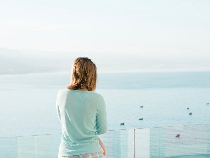 Woman on cruise balcony