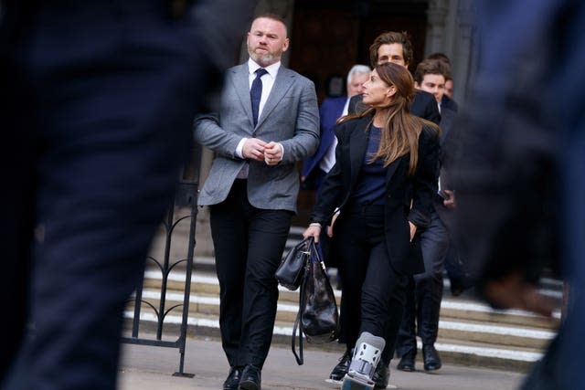 Wayne and Coleen Rooney outside the court on Tuesday 
