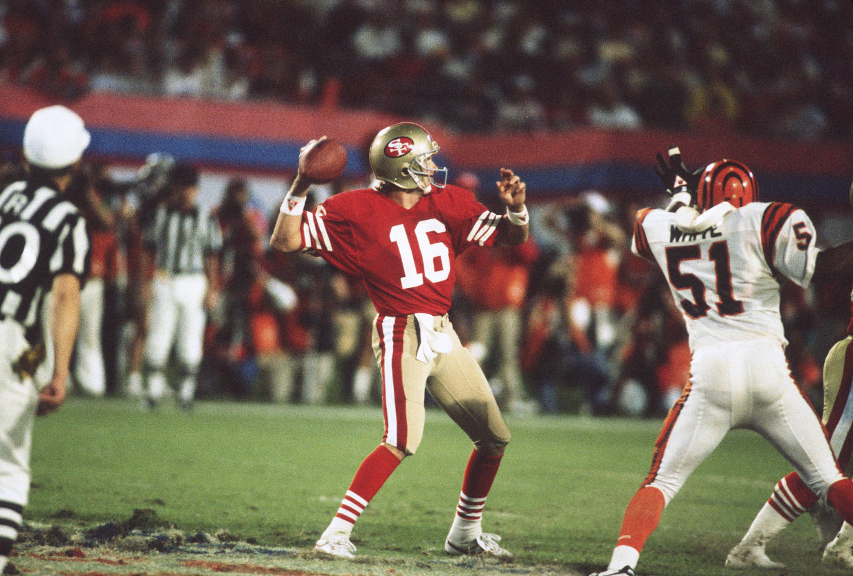 MIAMI, FL- JANUARY 22:  Joe Montana #16 of the San Francisco 49ers looks to throw a pass against the Cincinnati Bengals during Super Bowl XXIII  on January 22, 1989 at Joe Robbie  Stadium in Miami, Florida. The 49ers  won the Super Bowl 20-16. (Photo by Focus on Sport/Getty Images) 