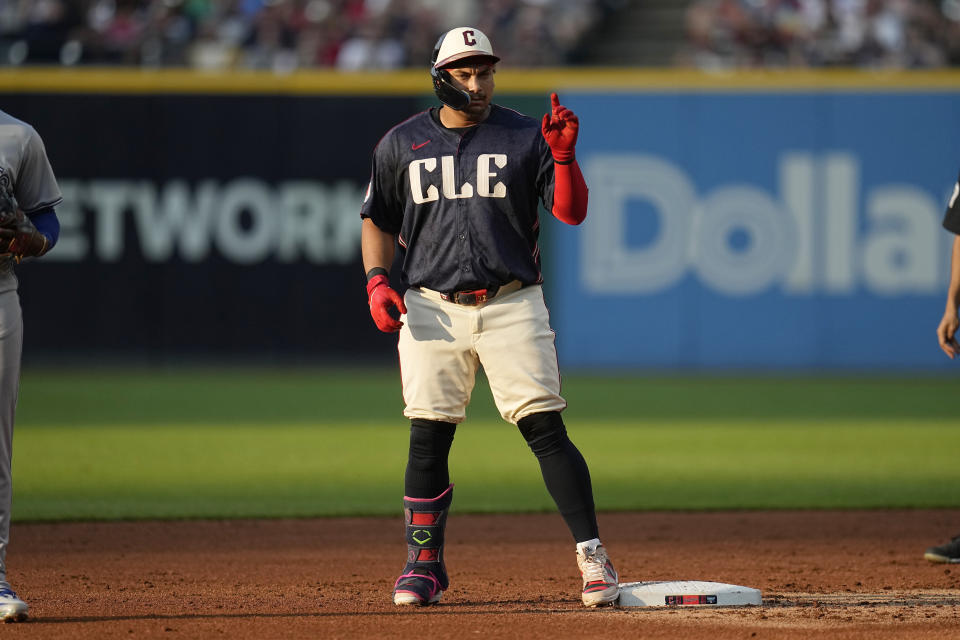 Cleveland Guardians' Josh Naylor gestures at second base after hitting a double against the Toronto Blue Jays during the second inning of a baseball game Friday, June 21, 2024, in Cleveland. (AP Photo/Sue Ogrocki)