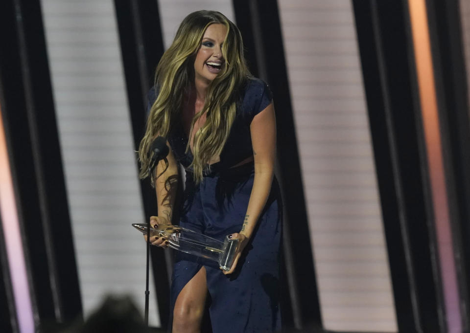 Carly Pearce accepts the female vocalist of the year award at the 55th annual CMA Awards on Wednesday, Nov. 10, 2021, at the Bridgestone Arena in Nashville, Tenn. (AP Photo/Mark Humphrey)