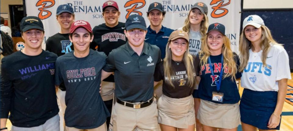 Benjamin seniors pose together after signing their letters of intent to compete at the next level on Tuesday, Nov. 7, ahead of National Signing Day.